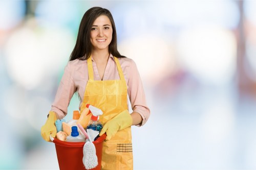 Cleaner discussing payment and service terms on a clipboard